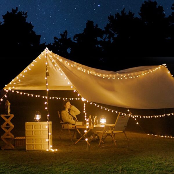 Enhance your indoor and outdoor ambiance with ZOUTOG Battery Operated String Lights. This 33ft string features 100 warm white LED lights on a durable wire, perfect for dark corners or tree decoration. With a remote control for easy operation, adjust brightness and choose from 8 flashing modes. The water-resistant design allows for versatile use, creating a warm and romantic atmosphere in your garden, yard, or any space you desire. Trust in ZOUTOG for energy-efficient and long-lasting LED lights, backed by a one-year guarantee.