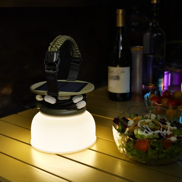 Illuminate your outdoor space with Color Solar String Lights featuring 3 color modes and a camping lantern with 3 brightness levels. This versatile set is perfect for decorating your patio, garden, or party. With a built-in rechargeable battery and multiple charging options, including solar and USB, these lights also double as a power bank for your devices. Portable and easy to hang, they are ideal for camping and outdoor adventures. Backed by a lifetime replacement guarantee, these lights offer both functionality and style.