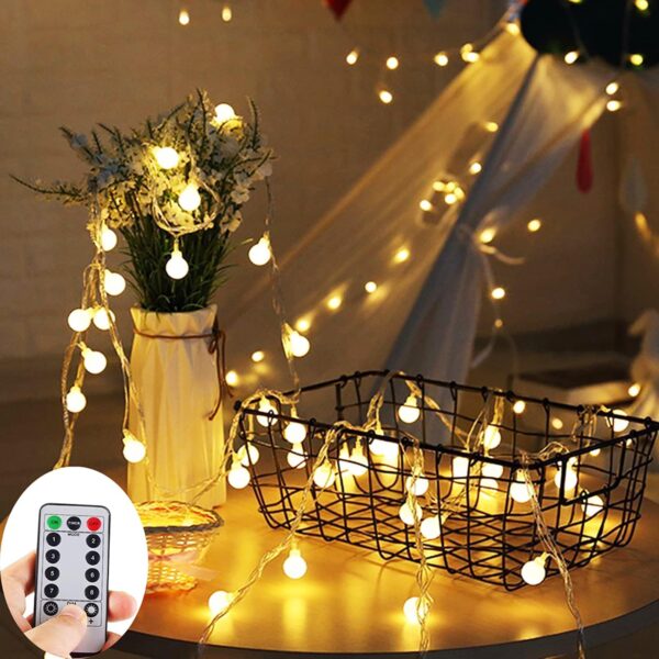 Enhance your indoor and outdoor ambiance with ZOUTOG Battery Operated String Lights. This 33ft string features 100 warm white LED lights on a durable wire, perfect for dark corners or tree decoration. With a remote control for easy operation, adjust brightness and choose from 8 flashing modes. The water-resistant design allows for versatile use, creating a warm and romantic atmosphere in your garden, yard, or any space you desire. Trust in ZOUTOG for energy-efficient and long-lasting LED lights, backed by a one-year guarantee.