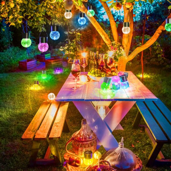 Illuminate your outdoor space with MAXvolador 12-Pack Hanging Solar Lights. These decorative cracked glass ball lights are solar-powered, weatherproof, and easy to install. Create a special atmosphere in your garden, patio, or wedding venue with these multicolor lights.